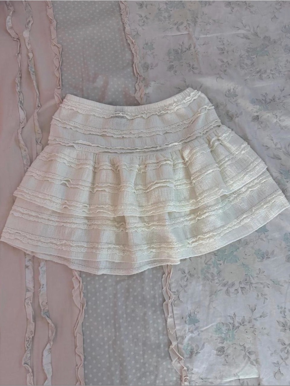 Cream ruffled mini skirt